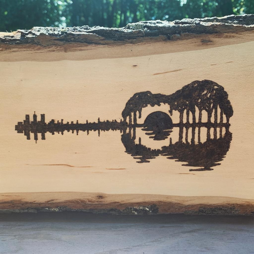 Woodburn Art of a Guitar and Nature Scene on LiveEdge Wood